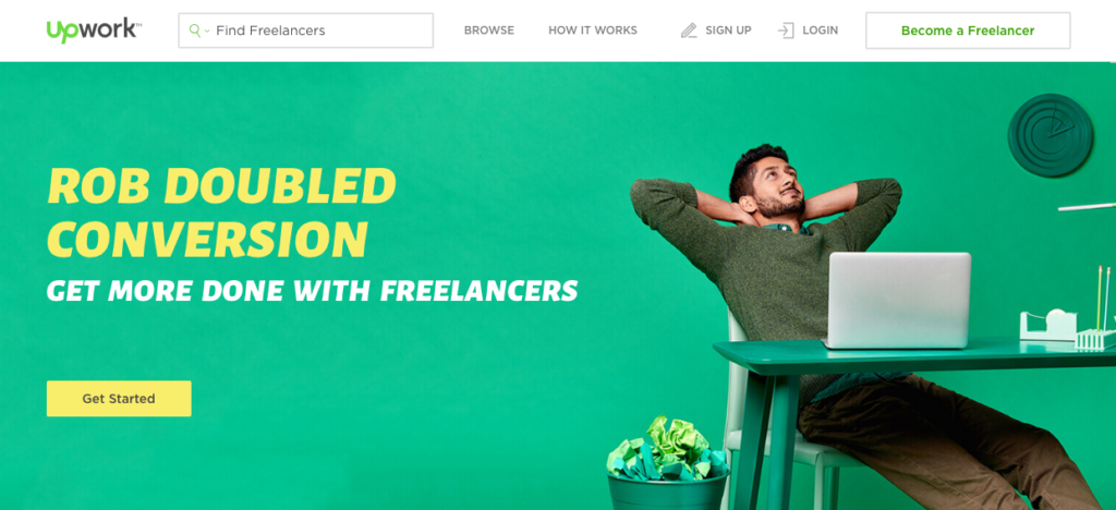 Screen shot of the home page of Upwork. A person sitting behind his computer relaxing and then it says that Rob Doubled Conversion: get more done with freelancers
