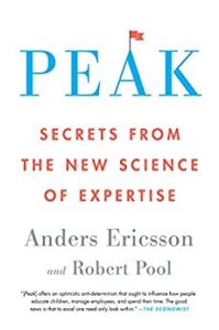 the cover of the book Peak. Big letters on top saying PEAK and then a subheading "secrets from the new science of expertise"